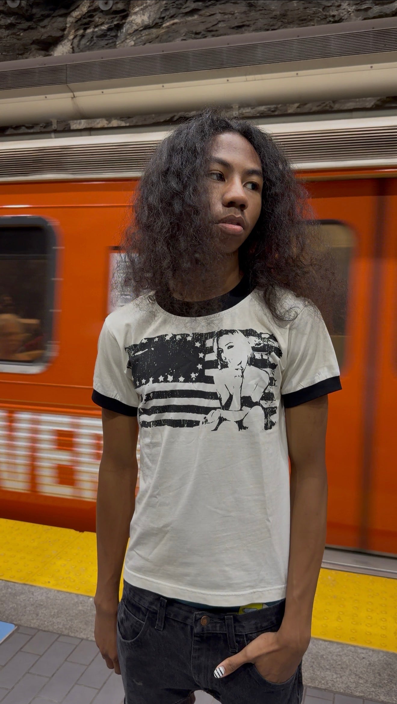 Black "distained" T-shirt by WithoutSaint featuring a minimalist design and comfortable fit, displayed flat on a white background.